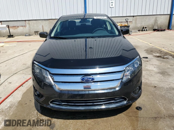 2012 Ford Fusion SE z VIN 3FAHP0HG8CR421796, wystawiony jako Copart lot #52534695 z przebiegiem 186 448 mil mil oraz Nie do naprawy • Non repairable. Historia ofert i sprzedaży dostępna na DreamBid. Obrazek 5.