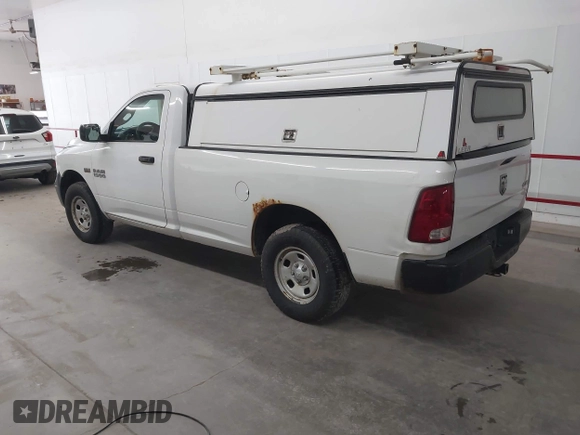 2014 Ram 1500 Tradesman z VIN 3C6JR7DT6EG285109, wystawiony jako IAAI lot #42306741 z przebiegiem 218 286 mil mil oraz . Historia ofert i sprzedaży dostępna na DreamBid. Obrazek 3.