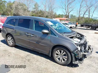 2017 Honda Odyssey SE with VIN 5FNRL5H37HB010208, listed as a IAAI auction lot 41828809 with 67,399 mi miles and . Bid and sale history available at carsss.com. Image 1.