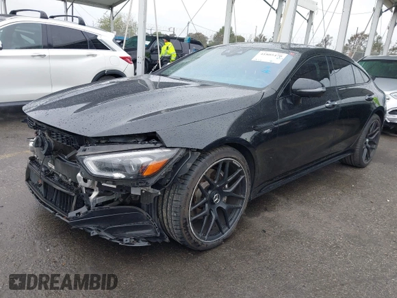 2022 Mercedes-Benz AMG GT 43 z VIN W1K7X5KB7NA048401, wystawiony jako IAAI lot #41805470 z przebiegiem 118 033 mil mil oraz . Historia ofert i sprzedaży dostępna na DreamBid. Obrazek 23.