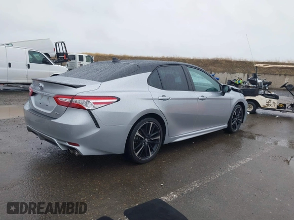 2020 Toyota Camry XSE with VIN 4T1K61AK1LU318098, listed as a IAAI auction lot 41097712 with 64,118 mi miles and . Bid and sale history available at DreamBid. Image 4.