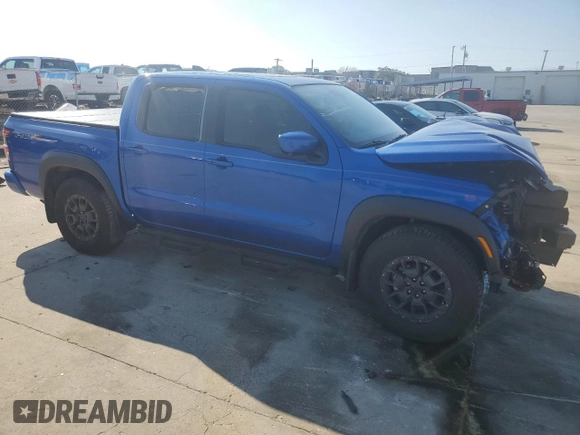 2024 Nissan Frontier Pro-X z VIN 1N6ED1EJ2RN646428, wystawiony jako Copart lot #44304215 z przebiegiem 5 853 mil mil oraz Szkoda całkowita • Salvage title. Historia ofert i sprzedaży dostępna na DreamBid. Obrazek 4.