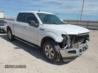 2019 Ford F-150 XL with VIN 1FTEW1E42KKE77610, listed as a IAAI auction lot 41765076 with 155,437 mi miles and . Bid and sale history available at DreamBid. Image 1.