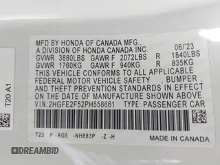 2023 Honda Civic Sedan Sport with VIN 2HGFE2F52PH558661, listed as a IAAI auction lot 41935307 with 24,543 mi miles. Bid and sale history available at carsss.com. Image 9.
