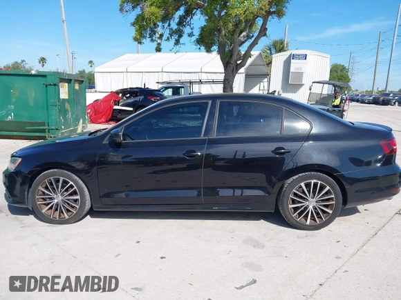 2016 Volkswagen Jetta Sport z VIN 3VWD17AJ9GM412257, wystawiony jako IAAI lot #41880133 z przebiegiem 119 692 mil mil oraz . Historia ofert i sprzedaży dostępna na DreamBid. Obrazek 14.