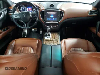 2016 Maserati Ghibli S Q4 z VIN ZAM57RTA4G1168220, wystawiony jako Copart lot #57850955 z przebiegiem 126 378 mil mil oraz Tytuł czysty. Historia ofert i sprzedaży dostępna na DreamBid. Obrazek 8.