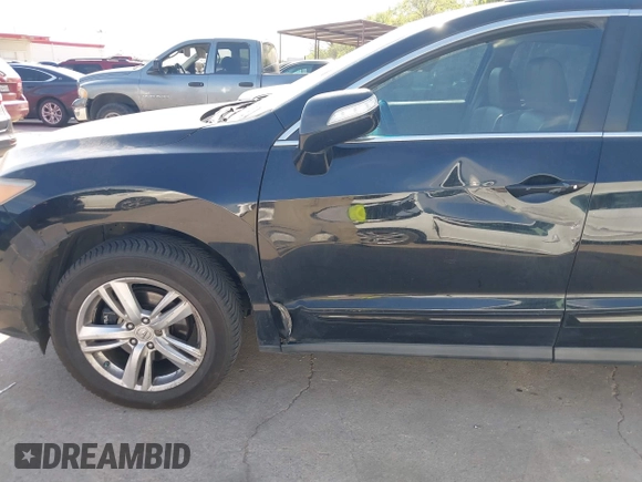 2014 Acura RDX Technology with VIN 5J8TB3H55EL001838, listed as a IAAI auction lot 41876530 with 214,266 mi miles and . Bid and sale history available at DreamBid. Image 6.