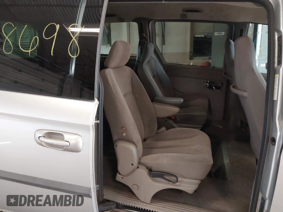 2003 Dodge Grand Caravan with VIN 2D4GP44353R166193, listed as a IAAI auction lot 41908698 with 181,371 mi miles and . Bid and sale history available at DreamBid. Image 8.
