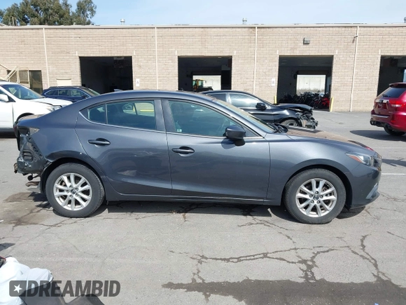 2015 Mazda Mazda3 i Touring with VIN 3MZBM1V74FM157512, listed as a IAAI auction lot 41844549 with 77,787 mi miles. Bid and sale history available at carsss.com. Image 14.