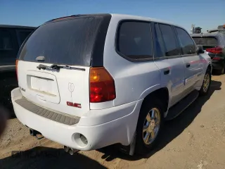 2002 GMC Envoy SLT with VIN 1GKDS13SX22184163, listed as a Copart auction lot 86400894 with 0 mi miles and Salvage Title. Bid and sale history available at carsss.com. Image 3.