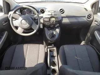 2012 Mazda 2 Sport with VIN JM1DE1KY8C0139339, listed as a Copart auction lot 54540565 with 63,380 mi miles and Salvage Title. Bid and sale history available at carsss.com. Image 8.