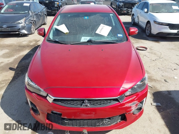 2016 Mitsubishi Lancer ES z VIN JA32U2FU3GU001857, wystawiony jako IAAI lot #41999674 z przebiegiem 65 520 mil mil oraz . Historia ofert i sprzedaży dostępna na DreamBid. Obrazek 12.