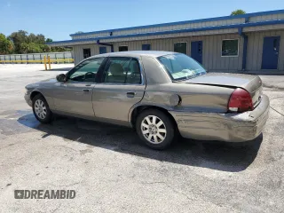 2006 Ford Crown Victoria LX z VIN 2FAFP74V56X126245, wystawiony jako Copart lot #56598055 z przebiegiem 91 400 mil mil oraz Szkody całkowita. Historia ofert i sprzedaży dostępna na DreamBid. Obrazek 2.