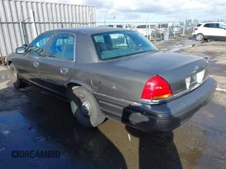 1999 Ford Crown Victoria Police with VIN 2FAFP71W9XX187581, listed as a IAAI auction lot 41522223 with 94,889 mi miles. Bid and sale history available at carsss.com. Image 3.