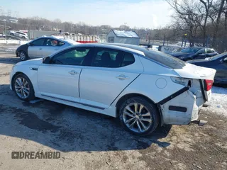 2015 Kia Optima SXL Turbo with VIN 5XXGR4A65FG428023, listed as a IAAI auction lot 41416027 with 100,372 mi miles and . Bid and sale history available at DreamBid. Image 3.