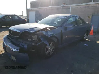 2000 Lincoln LS with VIN 1LNHM87A9YY872545, listed as a Copart auction lot 87043754 with 0 mi miles and Salvage Title. Bid and sale history available at carsss.com. Image 1.