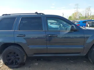 2007 Jeep Grand Cherokee Laredo with VIN 1J8GR48K77C582875, listed as a IAAI auction lot 42061653 with 259,767 mi miles. Bid and sale history available at carsss.com. Image 13.