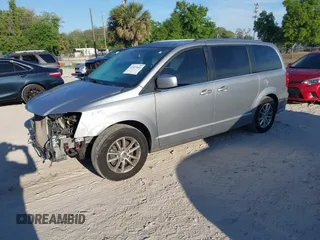 2018 Dodge Grand Caravan SXT with VIN 2C4RDGCG5JR267428, listed as a IAAI auction lot 41877661 with 103,633 mi miles and . Bid and sale history available at DreamBid. Image 22.