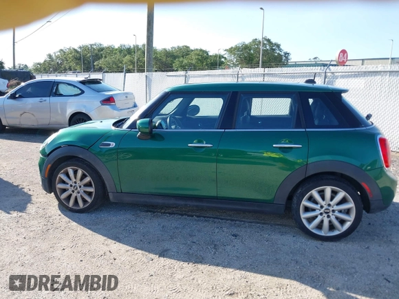 2020 MINI Hardtop 4 Door Cooper with VIN WMWXU7C06L2M63032, listed as a IAAI auction lot 42572567 with 86,220 mi miles and . Bid and sale history available at DreamBid. Image 14.