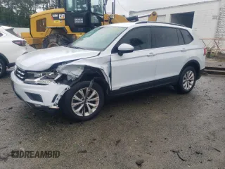 2018 Volkswagen Tiguan S with VIN 3VV1B7AX1JM021989, listed as a Copart auction lot 58901435 with 88,253 mi miles and Salvage title. Bid and sale history available at DreamBid. Image 1.