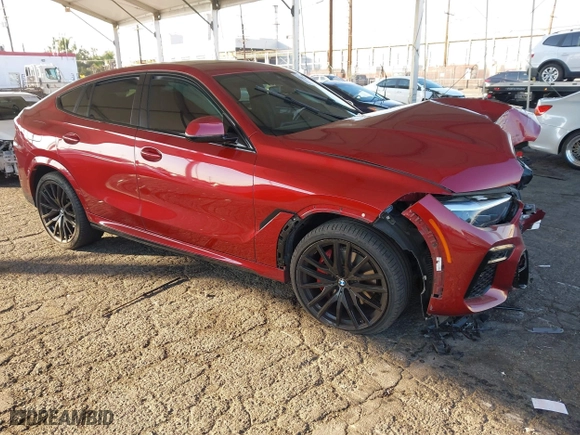 2022 BMW X6 xDrive40i with VIN 5UXCY6C06N9K57184, listed as a IAAI auction lot 41302467 with 42,073 mi miles. Bid and sale history available at carsss.com. Image 1.
