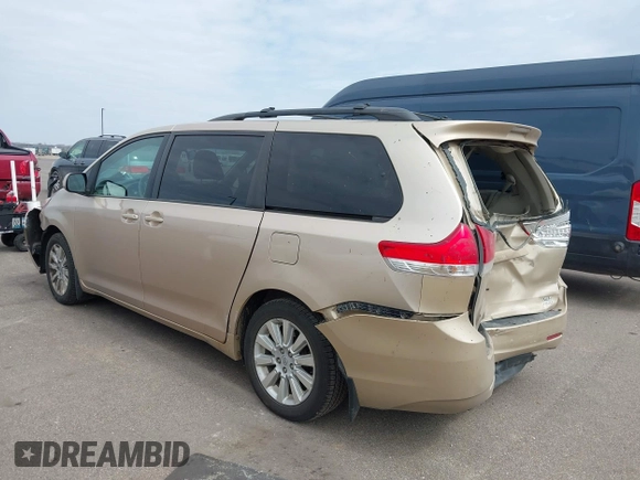 2013 Toyota Sienna XLE with VIN 5TDDK3DC4DS055796, listed as a IAAI auction lot 41993530 with 256,735 mi miles and . Bid and sale history available at DreamBid. Image 3.