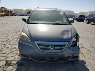 2007 Honda Odyssey EX-L z VIN 5FNRL38677B424117, wystawiony jako Copart lot #58814235 z przebiegiem 188 908 mil mil oraz Szkoda całkowita • Salvage title. Historia ofert i sprzedaży dostępna na DreamBid. Obrazek 5.