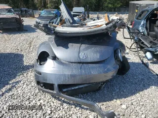 2006 Volkswagen Beetle z VIN 3VWRR31C26M401236, wystawiony jako Copart lot #72189394 z przebiegiem Nie podano mil oraz Szkoda całkowita • Salvage title. Historia ofert i sprzedaży dostępna na DreamBid. Obrazek 5.
