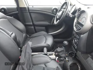2012 MINI Countryman S with VIN WMWZC5C56CWL56311, listed as a IAAI auction lot 41825109 with Not Provided miles and . Bid and sale history available at DreamBid. Image 5.