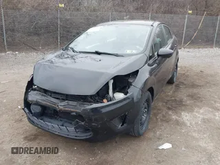 2012 Ford Fiesta S with VIN 3FADP4AJ8CM145208, listed as a IAAI auction lot 41784292 with 99,167 mi miles. Bid and sale history available at carsss.com. Image 6.