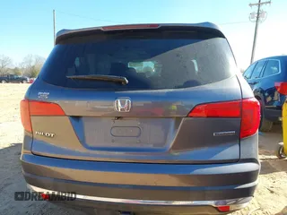 2017 Honda Pilot Touring with VIN 5FNYF5H92HB038893, listed as a IAAI auction lot 41639555 with 100,354 mi miles. Bid and sale history available at carsss.com. Image 16.