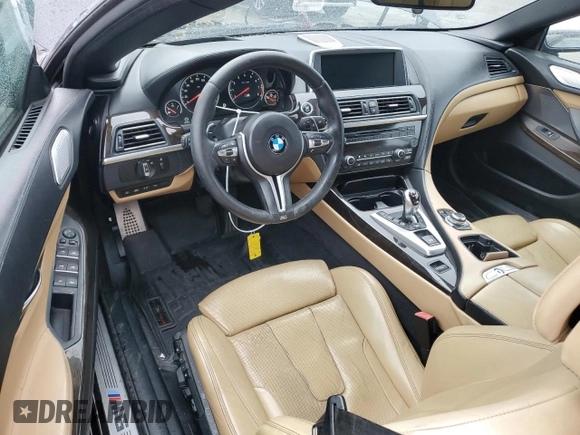 2014 BMW M6 z VIN WBSLZ9C50EDZ78599, wystawiony jako Copart lot #84724974 z przebiegiem 115 051 mil mil oraz Czysty tytuł • Clean title. Historia ofert i sprzedaży dostępna na DreamBid. Obrazek 8.