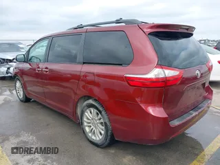 2015 Toyota Sienna XLE with VIN 5TDYK3DC0FS565597, listed as a IAAI auction lot 42062160 with 181,543 mi miles. Bid and sale history available at carsss.com. Image 3.