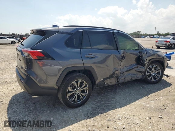 2023 Toyota RAV4 Hybrid XLE Premium z VIN JTMB6RFV2PD105642, wystawiony jako Copart lot #50714615 z przebiegiem Nie podano mil oraz Szkoda całkowita • Salvage title. Historia ofert i sprzedaży dostępna na DreamBid. Obrazek 3.