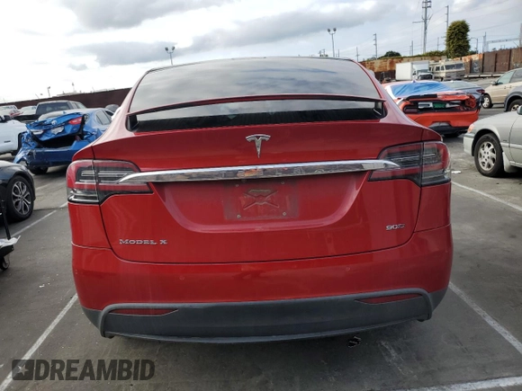 2016 Tesla Model X 70D with VIN 5YJXCAE28GF002399, listed as a Copart auction lot 50884225 with 73,113 mi miles and Salvage Title. Bid and sale history available at DreamBid. Image 6.