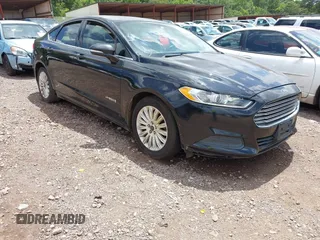 2014 Ford Fusion SE Hybrid with VIN 3FA6P0LU7ER264379, listed as a IAAI auction lot 42479582 with 241,078 mi miles and . Bid and sale history available at DreamBid. Image 1.