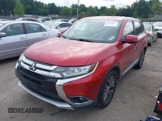 2017 Mitsubishi Outlander SE z VIN JA4AZ3A3XHZ059420, wystawiony jako IAAI lot #42611077 z przebiegiem 130 406 mil mil oraz . Historia ofert i sprzedaży dostępna na DreamBid. Obrazek 17.