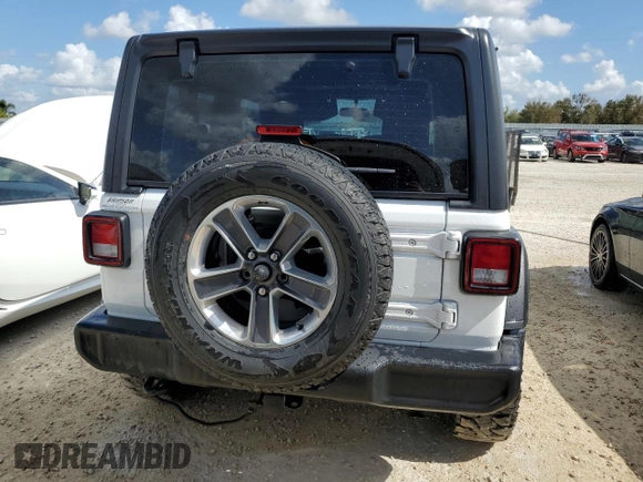 2021 Jeep Wrangler Sport with VIN 1C4GJXAG8MW621800, listed as a Copart auction lot 75312824 with 49,409 mi miles and Non Repairable. Bid and sale history available at DreamBid. Image 6.