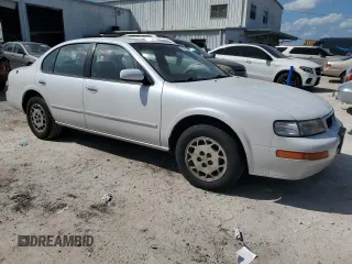 1995 Nissan Maxima GLE с VIN JN1CA21D6ST059369, выставлен на аукционе Copart как лот 74794884 с пробегом 246 806 миль миль и Списание • Salvage title. История ставок и продаж доступна на DreamBid. Изображение 4.