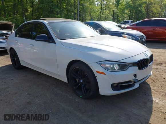 2013 BMW 3 Series 335i xDrive with VIN WBA3B9C54DF587421, listed as a IAAI auction lot 42165857 with 142,331 mi miles. Bid and sale history available at carsss.com. Image 1.