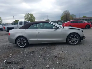 2014 Audi A5 Premium Plus z VIN WAULFAFH7EN001894, wystawiony jako IAAI lot #42082669 z przebiegiem 78 624 mil mil oraz . Historia ofert i sprzedaży dostępna na DreamBid. Obrazek 13.