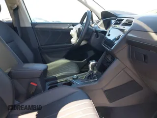 2023 Volkswagen Tiguan SE with VIN 3VVMB7AX4PM128427, listed as a IAAI auction lot 42054477 with 29,731 mi miles and . Bid and sale history available at DreamBid. Image 5.