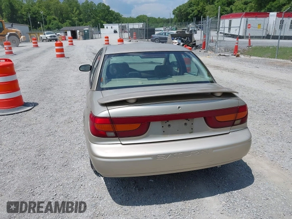2001 Saturn SL z VIN 1G8ZK54721Z272773, wystawiony jako IAAI lot #42449133 z przebiegiem 56 714 mil mil oraz . Historia ofert i sprzedaży dostępna na DreamBid. Obrazek 16.