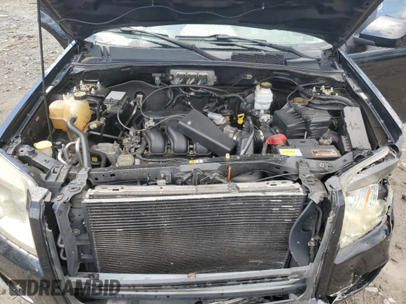 2008 Mercury Mariner Premier with VIN 4M2CU97128KJ17304, listed as a Copart auction lot 55965555 with 134,473 mi miles and Salvage title. Bid and sale history available at DreamBid. Image 12.