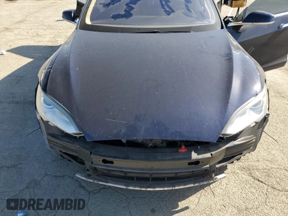 2013 Tesla Model S z VIN 5YJSA1CN8DFP05395, wystawiony jako Copart lot #51771645 z przebiegiem 111 851 mil mil oraz Szkoda całkowita • Salvage title. Historia ofert i sprzedaży dostępna na DreamBid. Obrazek 13.
