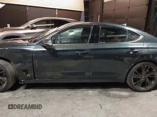2023 Genesis G70 2.0T with VIN KMTG34TA3PU115553, listed as a IAAI auction lot 41822917 with 35,784 mi miles and . Bid and sale history available at DreamBid. Image 14.