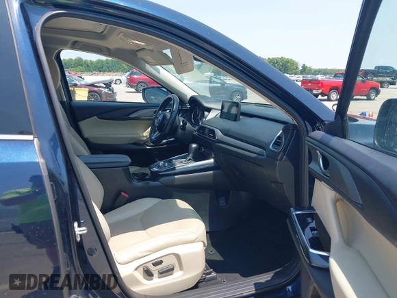 2018 Mazda CX-9 Touring with VIN JM3TCBCY3J0220372, listed as a IAAI auction lot 42405192 with 104,556 mi miles and . Bid and sale history available at DreamBid. Image 5.