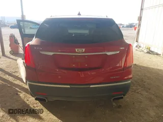 2019 Cadillac XT5 Premium Luxury FWD z VIN 1GYKNERS0KZ157287, wystawiony jako IAAI lot #41106524 z przebiegiem 131 464 mil mil oraz . Historia ofert i sprzedaży dostępna na DreamBid. Obrazek 16.