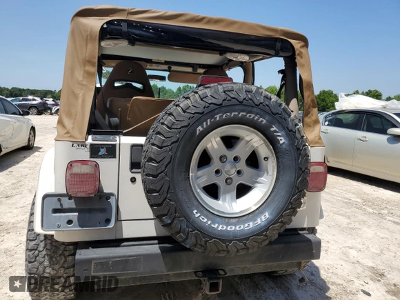 2001 Jeep Wrangler Sahara with VIN 1J4FA59S81P321490, listed as a Copart auction lot 57320005 with 180,959 mi miles and Salvage title. Bid and sale history available at DreamBid. Image 6.