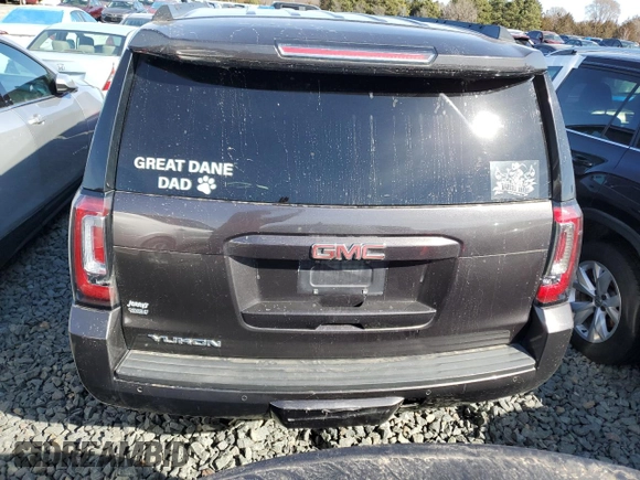 2015 GMC Yukon SLT with VIN 1GKS2BKC7FR279302, listed as a Copart auction lot 47827085 with 176,076 mi miles and Salvage Title. Bid and sale history available at carsss.com. Image 6.